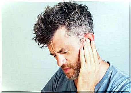 A man with pain in his ear. 