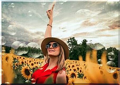 woman in a field of sunflowers