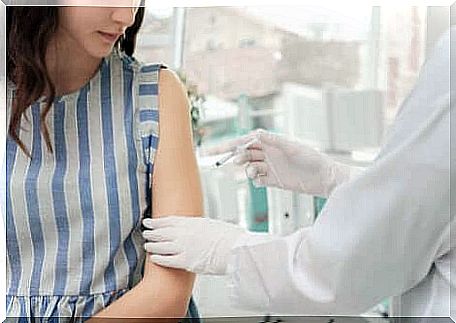 A vaccine in a woman.