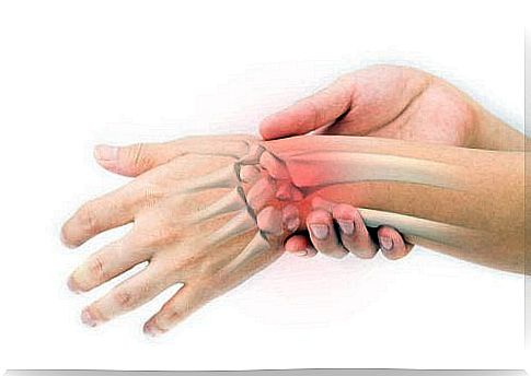 Person suffering from pain in the bones of the hands