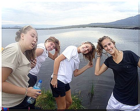 young girls washing their hair 