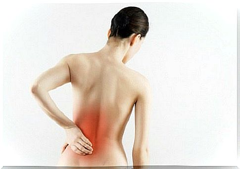 Back pain in the lumbar area.