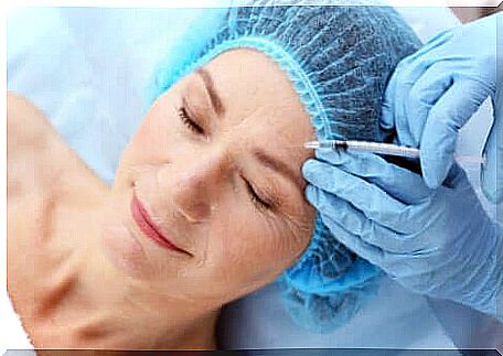 Injection of hyaluronic acid into a woman's face. 