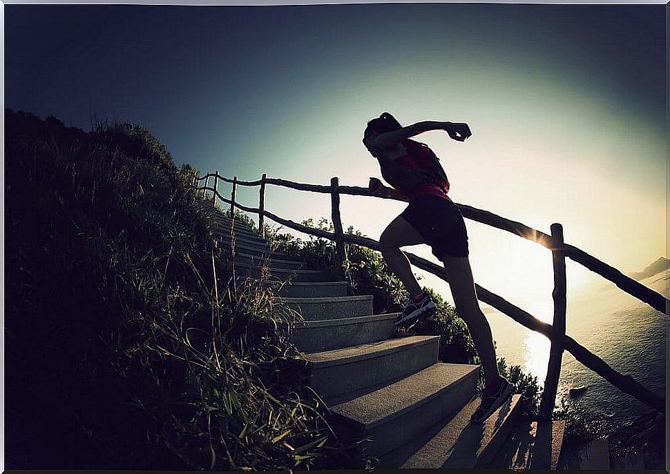 Woman going up the stairs 