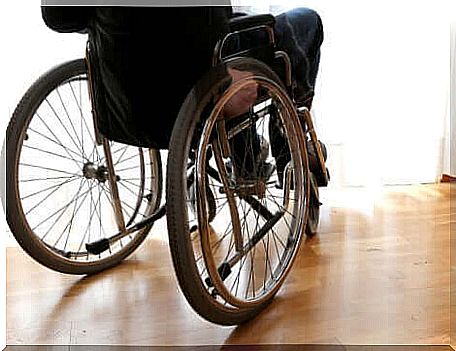 A person in a wheelchair.